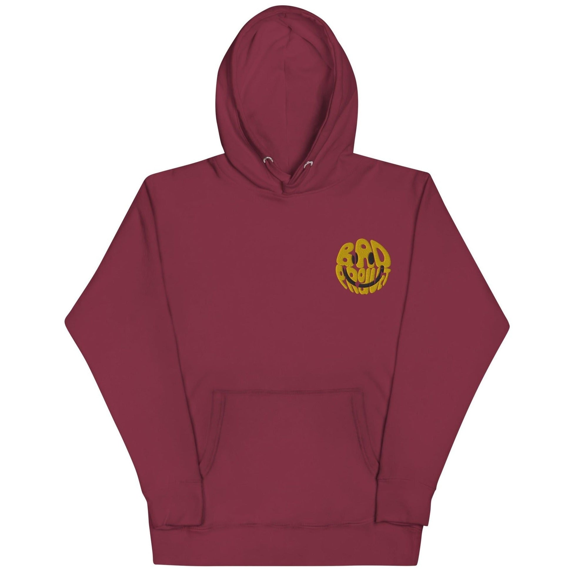 Maroon hoodie featuring an embroidered gold smiley logo
